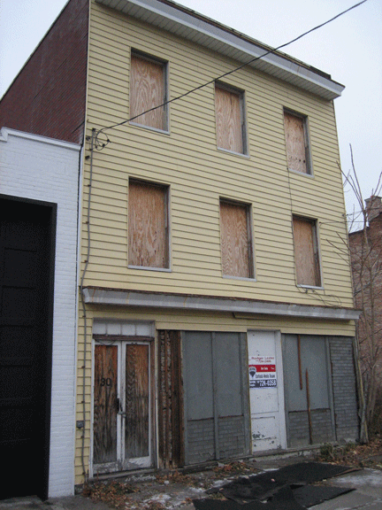 Vacant House With Storefront, Will Be Torn Down For Howe Library Parking Lot