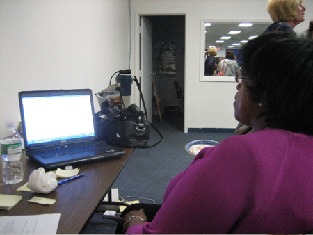 Common Council Member Carolyn McLaughlin (Ward 2) Watches The Laptop