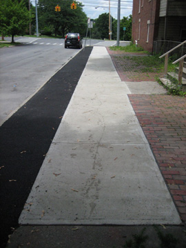 Three Quarters Of A New Sidewalk On S. Swan