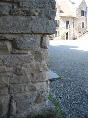 At The Entrance, Bottom Rounded Stones Are Original, Square Stones At Top Are New