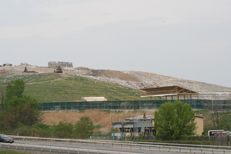 Part Of The Rapp Road "Landfill," Note How Waste Is Encroaching Upon The Green "Restored" Part Of The Dump {Photo Bert Schou}Part Of The Rapp Road "Landfill," Note How Waste Is Encroaching Upon The Green "Restored" Part Of The Dump {Photo Bert Schou}