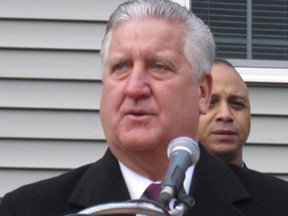 Lester Freeman Stands Behind Jerry Jennings