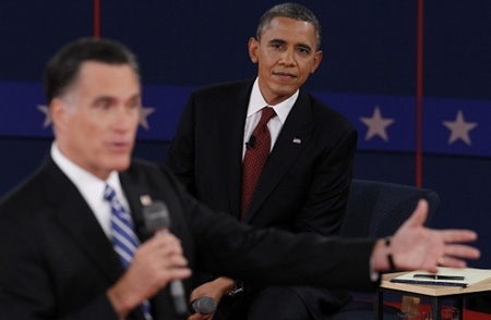 The President Sits While Romney Jabbers Entertainingly