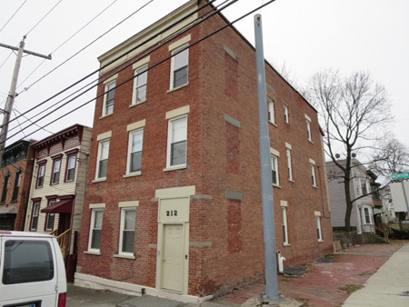 Building At South Swan And Morton Avenue, Sold For An Unexpectedly High Price, Recently Abandoned Building In Background At Right