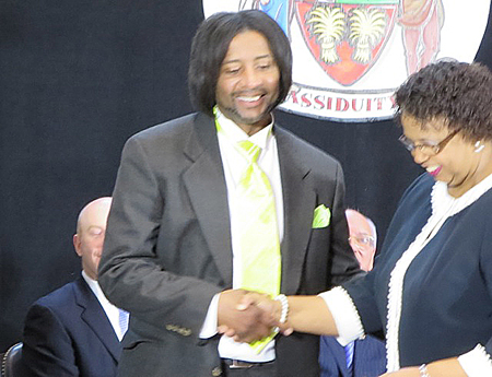Mark Robinson (5th Ward) Congratulated By Carolyn McLaughlin After Signing