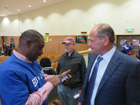 Casino Jobs Supporter Willie White Greets David Flaum Before the Presentation At Giffen Public School 