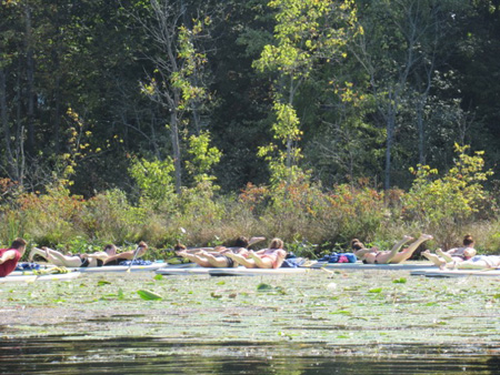 Ladies Doing Yoga On Paddleboards