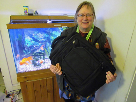 The Wife With Her Computer Bag Repaired By Lev