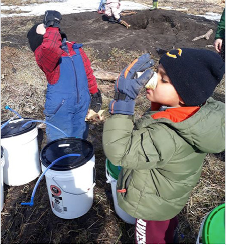 Kids Testing Finished Maple Syrup At Radix 