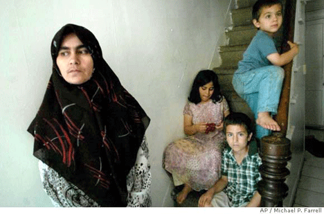 Mr. Aref's Family:��Zuhor Jalal, Alaa, 8, Raiber, 7, and Kotcher, 5, in their home.