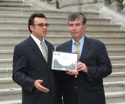 Senator Breslin Receives An Award From Environmental Advocates Director Rob Moore