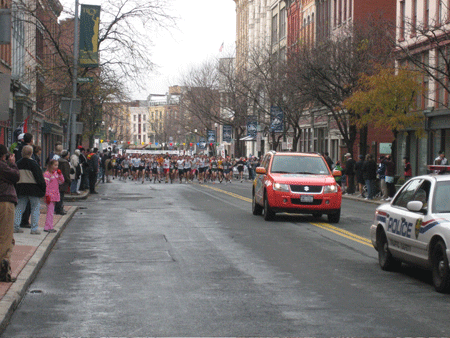 10k Takes Off At 10 AM, Police And Press Car Precede The Runners