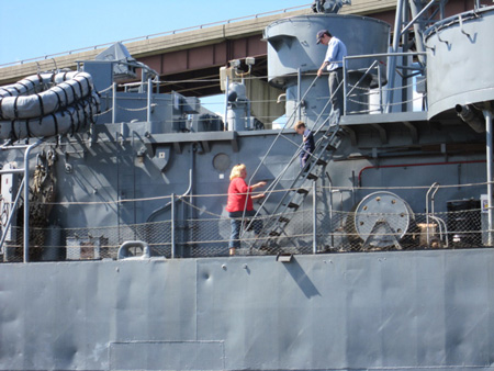 Tourists Inspect The USS Slater