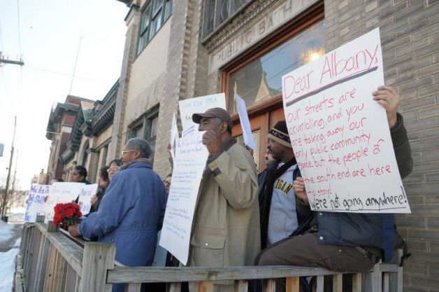 Supporters of Albany's Public Bath No. 2 rally at the building on Thursday, protesting its closing. (Paul Buckowski / Times Union)  Read more: http://www.timesunion.com/local/article/Pool-fans-make-splash-on-last-day-928525.php#ixzz1Ah8avQZs