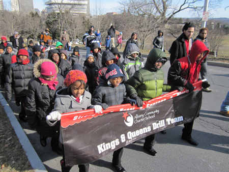 Brighter Choice Children March Wearily While Overseers Scowl
