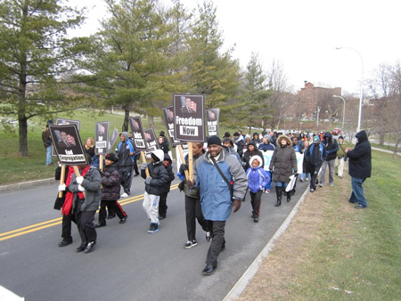 Marchers Carry Safe Generic Signs