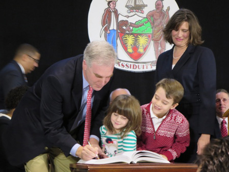 Treasurer Darius Shahinfar Signs With Wife And Albany County Legislator Noelle Kinsch And Their Kids