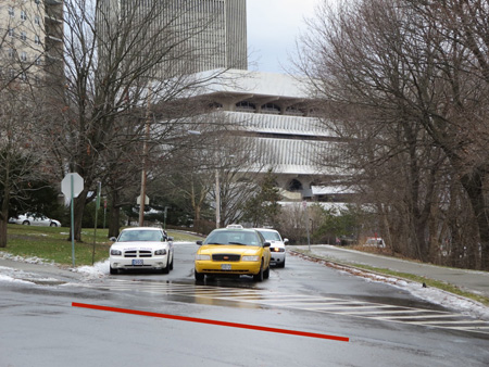 The Red Line Show Where Cars Normally Have To Stop To See Around Parked Cars, Apparently Confused By The Parked Police Car The Taxi Driver Stopped At The Crosswalk