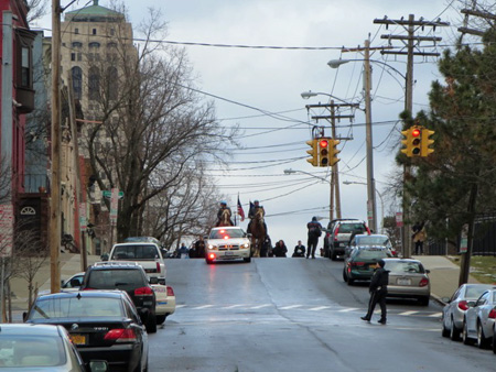 The Marchers Appear At The Crest Of The Hill