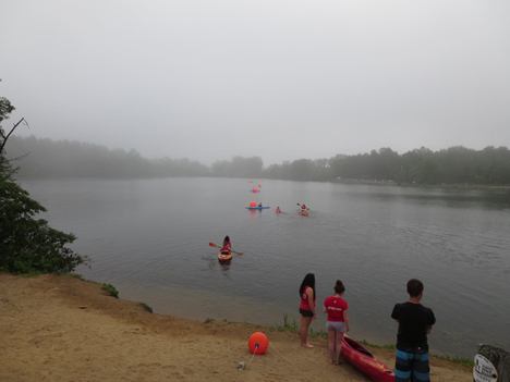 Lifeguards Head Out On Kayaks And Paddle Boards To Man Their Positions On Rensselaer Lake Before The Pine Bush Triathlon Begins