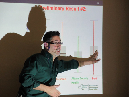 Brian Frank Of The Emissions Measurement Research Group Explains The Air Monitoring Process At The Ezra Prentice Community Room