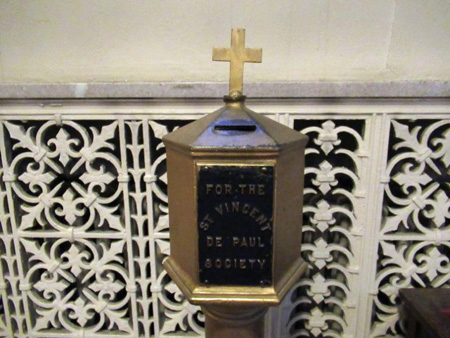 “For The St. Vincent De Paul Society,” The Ornate Iron Grate Is The Radiator Cover