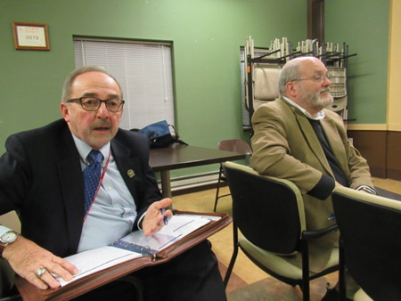 Water Commissioner Joe Coffey Explains To A Third Avenue Resident While Deputy Water Commissioner Bill Simcoe Listens